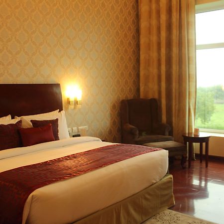 Hotel Ramada By Wyndham Jaipur Jaisinghpura Exterior foto