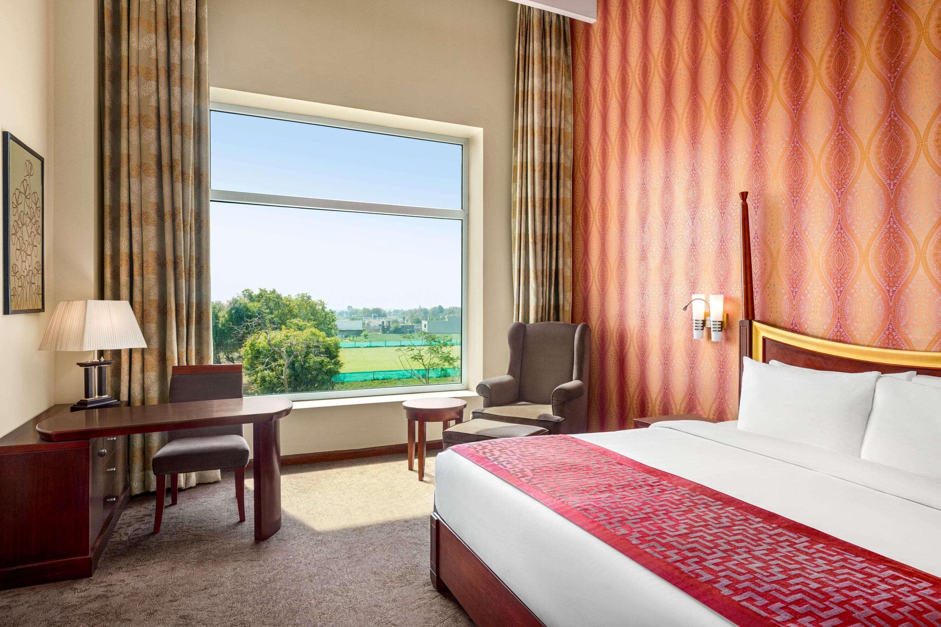 Hotel Ramada By Wyndham Jaipur Jaisinghpura Exterior foto